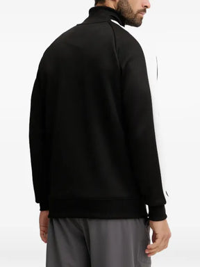 PUMA T7 logo-embroidered panelled jacket